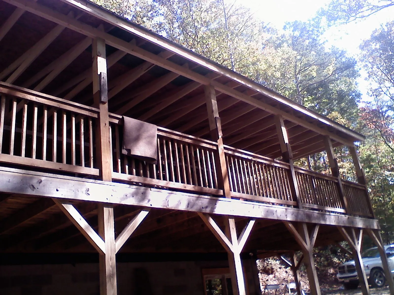 Timber framing under a new elevated porch and deck — Roof Leak Repair in Collegedale by Roofing Brothers